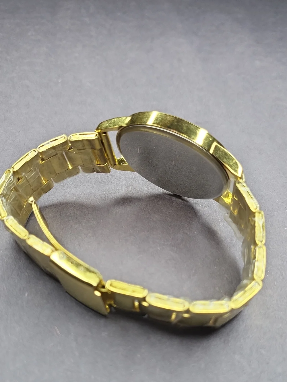 Geneva Gold Tone Watch with Red Dial